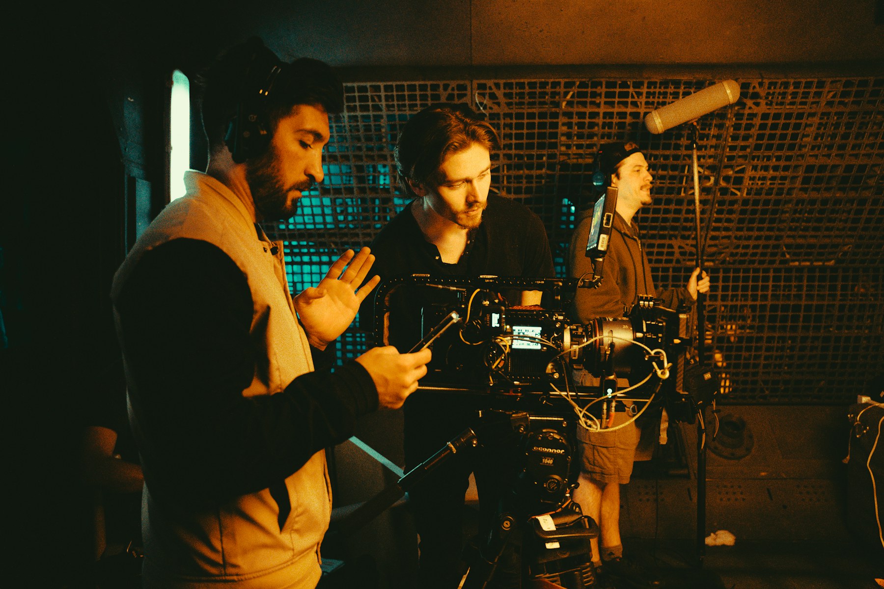 Film crew working with professional camera and sound equipment