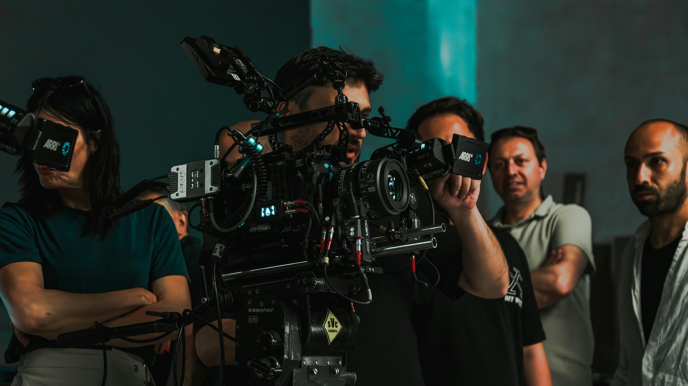 Professional film crew operating a cinema camera on set