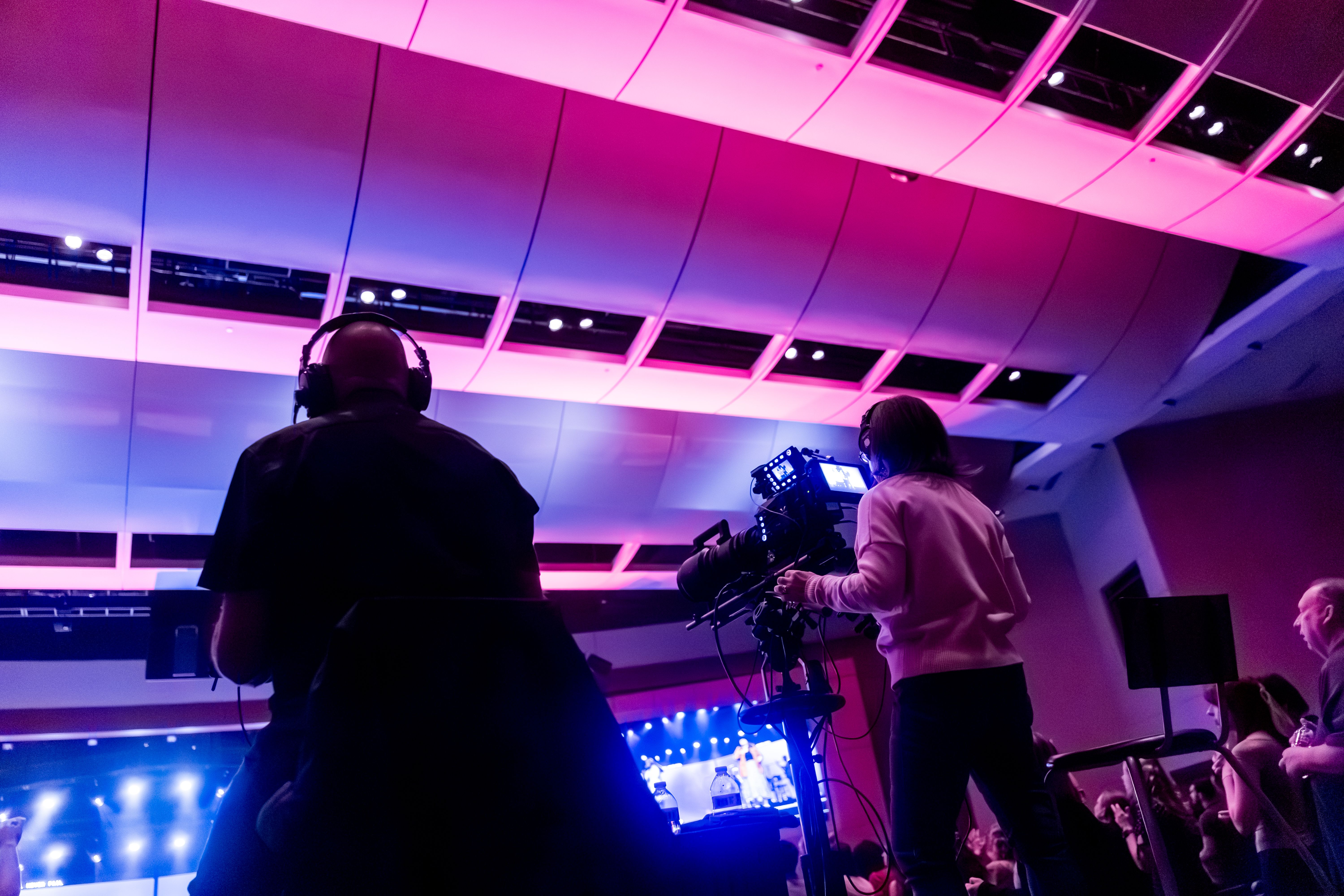 Professional camera crew covering a live event